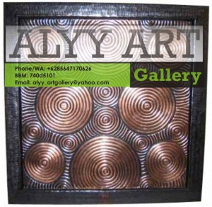 relief tembaga ukir 2