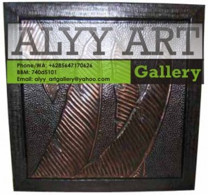 relief tembaga dedaunan