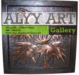 relief tembaga daun kepala